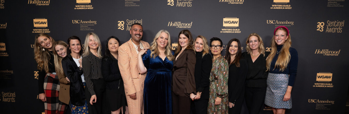 Actress Kathryn Hahn, center, and the creative team of Hulu's 
